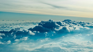 Sky clouds plane wing ocean 2 - cloud below free wallpaper