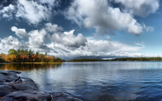 Lake rocks trees clouds sky - the water free wallpaper