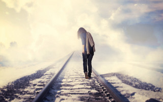 Person standing train track sky - their back free wallpaper