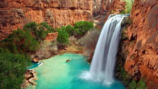 Waterfall man boat cliff water - impressionist free wallpaper