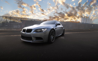 Silver car cloudy sky cityscape - the background and a building in the background free wallpaper
