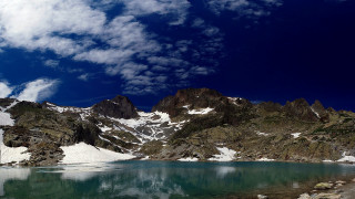 Mountain lake clouds nature reflection - a lake in the foreground free wallpaper