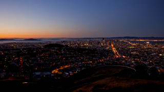 City lights mountains hill night 2 - a view of the city free wallpaper