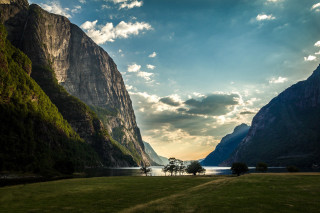 Grassy field mountain water trees - allan linder free wallpaper