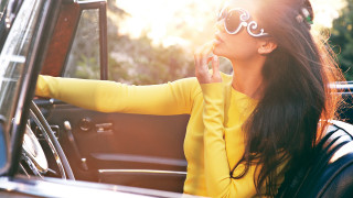Woman yellow shirt sunglasses car - impressionist free wallpaper