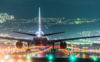 Jetliner night cityscape lights reflection - night time free wallpaper