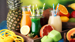 Fruit juices wooden containers table - a blue cloth free wallpaper