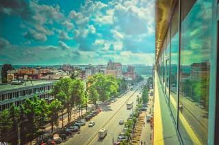 City street cars clouds building - a large window free wallpaper