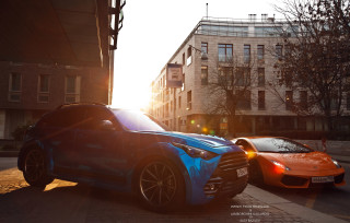 Blue orange sports cars city - photorealistic lighting free wallpaper