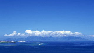 Plane water mountains clouds sky - over a body of water free wallpaper