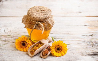 Honey sunflowers wooden table food - a spoon and spoon rest free wallpaper