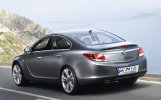 Silver car mountain road ocean - a silver car free wallpaper