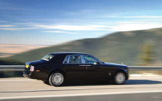 Black car mountain road luxury - a road next free wallpaper