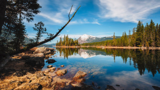 Lake trees rocks mountain sky - the distance free wallpaper