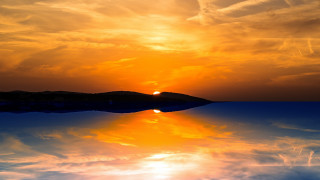 Sunset water mountain boat clouds - a sunset over a body of water free wallpaper