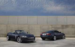 Black sports cars parking lot - wispy free wallpaper