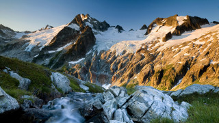 Mountain range stream grassy landscape - a stream running free wallpaper