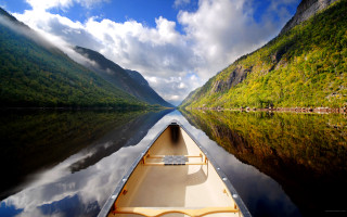 River mountains clouds boat landscape - arthur quartley free wallpaper