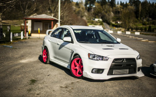 White car parking lot house 2 - red rim free wallpaper