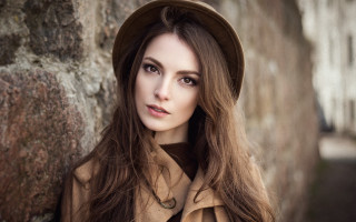 Woman hat coat stone wall - a stone wall free wallpaper