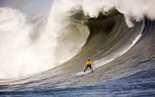 Surfing man wave ocean moon - top of a surfboard in the ocean free wallpaper