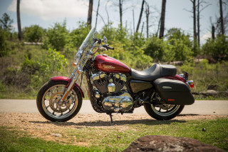 Red motorcycle dirt road wooded - a red motorcycle free wallpaper