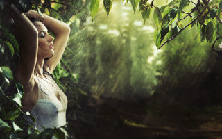 Woman rain forest posing nature - her arm behind her head free wallpaper