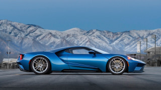 Blue sports car mountains sky - the background and a sky background free wallpaper