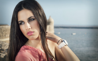 Woman longhair water boat beach - a boat in the background free wallpaper