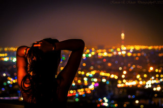 Woman city night christmas glowing - farid mansour free wallpaper