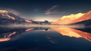 Mountain lake city sunset clouds - a lake in the foreground and a mountain range in the background free wallpaper