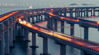 Long bridge city lights sunset - a long bridge free wallpaper