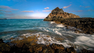 Rocky shore clouds blue sky - a rocky shore free wallpaper