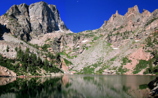 Mountain lake forest sky nature 3 - a lake in the foreground and a forest in the background free wallpaper
