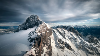 Snowy mountain city lake beach - tall peak free wallpaper