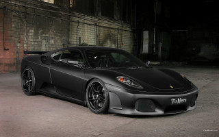 Black sports car brick wall - a sign free wallpaper