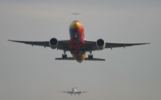 Large jetliner cloudy sky airport - an airport free wallpaper