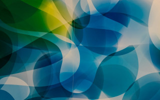Blue green abstract circles yellow - a yellow center in the middle free wallpaper