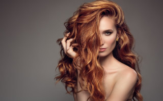Red haired woman blowing hair 2 - long red hair free wallpaper