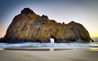 Beach rock formation opening water - adobe lightroom free wallpaper