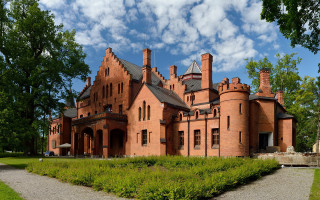Red brick castle clock tower - a clock tower free wallpaper