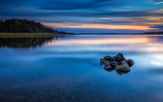 Lake rocks clouds trees aurora - the middle of it free wallpaper