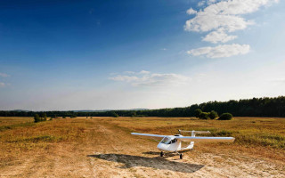 Small plane field trees blue - a dirt road in a field free wallpaper