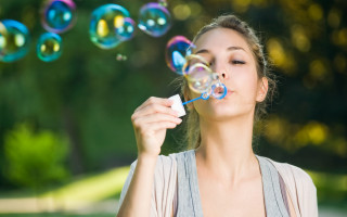 Bubbles blowing woman blue toothbrush - her mouth free wallpaper
