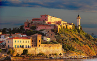 Hilltown lighthouse autumn cityscape bridge - cagnaccio di san pietro free wallpaper