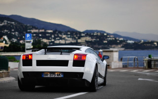 White sports car lake mountains - didier mouron free wallpaper