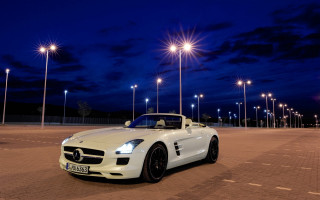 White sports car night city 6 - a parking lot free wallpaper