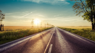 Sunrise road trees clouds lake - a line of trees free wallpaper