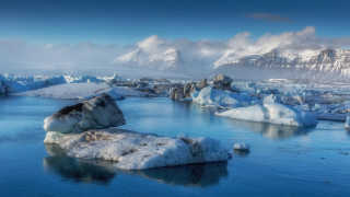 Snowy mountains ice covered water - covered free wallpaper