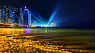 City skyline bright light show - daren bader free wallpaper